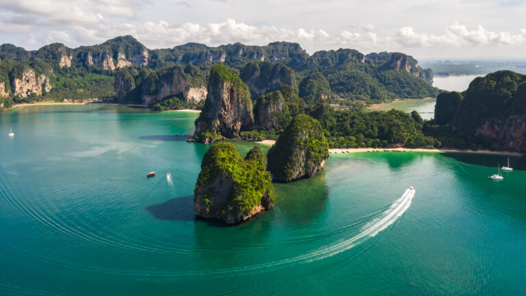 aerial view limestone and passenger boat at rairay and aonang be